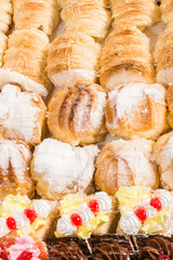 Background of different desserts with cream