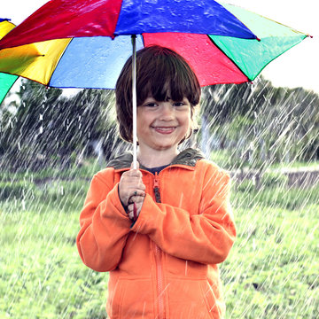 boy play in rain