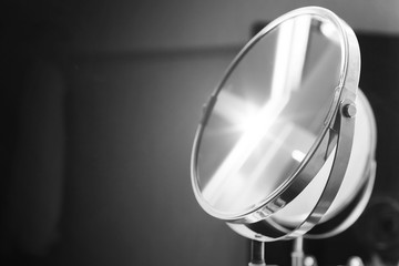 Round bathroom mirror with illumination, monochrome