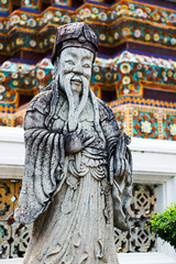 Fototapeta na wymiar Stone Statue in Wat Pho temple, Bangkok, Thailand