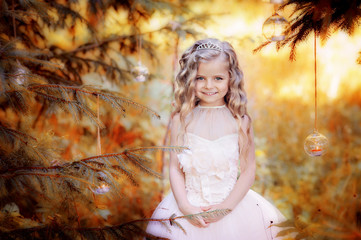 Little cute girl walking in the woods