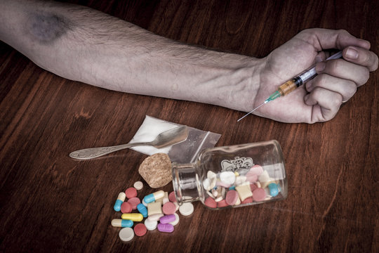 Syringe in Hand