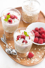 healthy dessert with oatmeal, whipped cream and raspberries