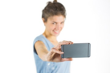 Casual brunette taking a selfie