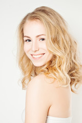 Obraz premium Cute Woman with Makeup and Curly Hairstyle