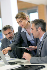 Business partners working together in office