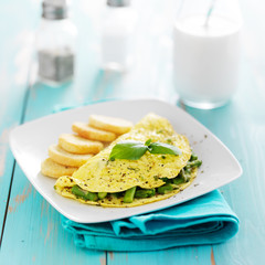 asparagus egg omelet with basil garnish
