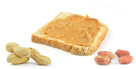 An open faced peanut butter sandwich on white bread