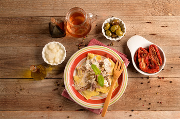 RAVIOLI WITH MUSHROOMS AND BACON