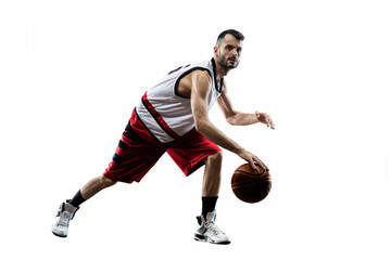 Isolated basketball player in action is flying high