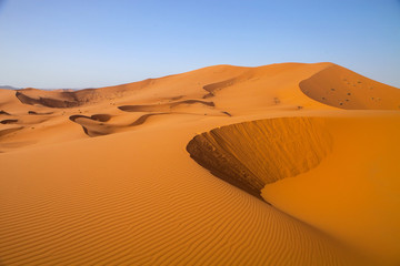 large dunes in the Sahara deformed by the wind, Morocco