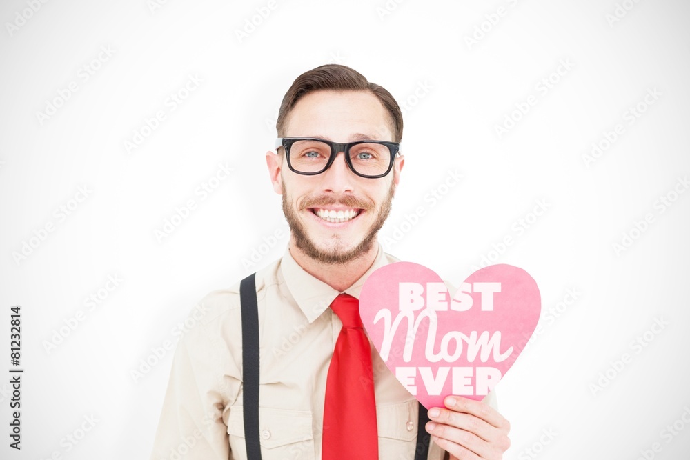 Aufkleber Composite image of geeky hipster smiling and holding heart card