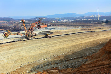 Excavator at the iron ore opencast mining