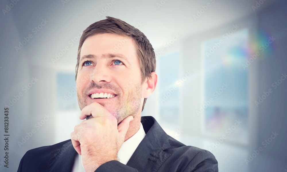 Aufkleber composite image of businessman smiling and thinking