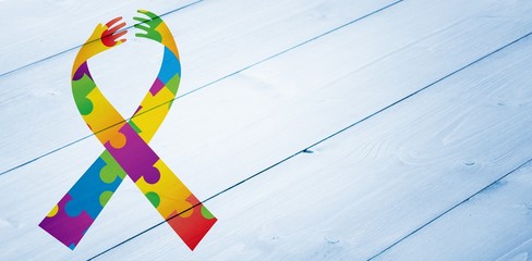 Composite image of autism awareness ribbon - Powered by Adobe