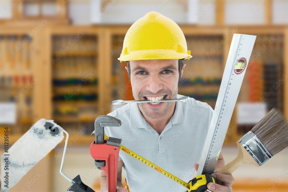 Poster Composite image of happy worker with various equipment