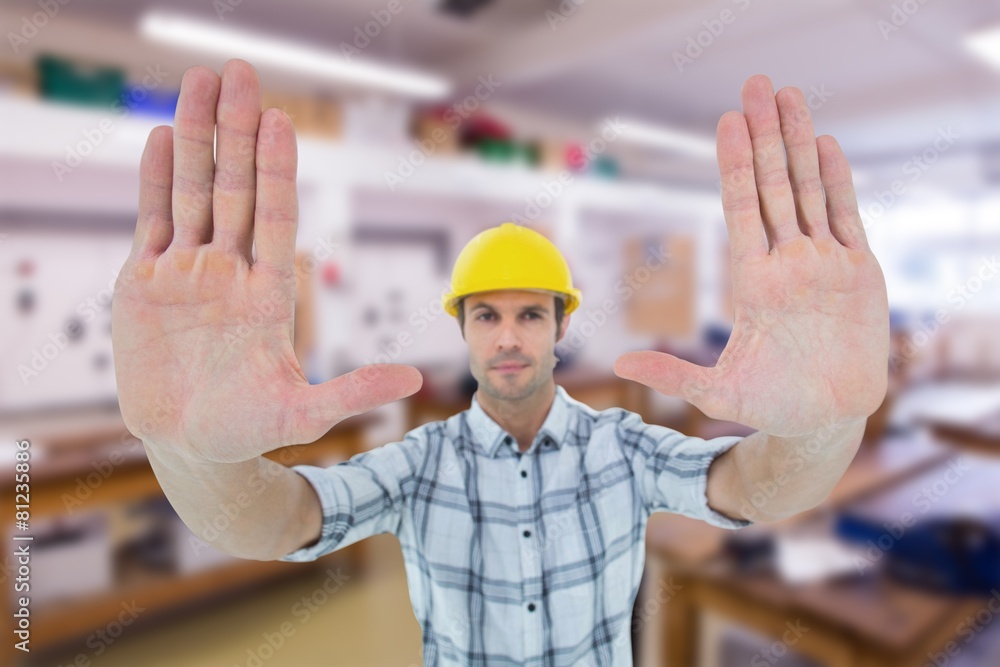 Poster Composite image of confident architect forming hand frame