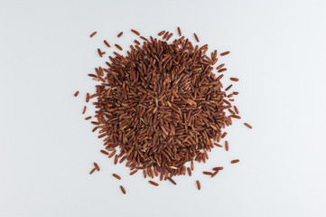 pile of red rice isolated on white