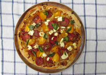 Goat cheese tart on linen cloth