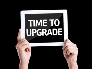 Tablet pc with text Time To Upgrade isolated on black