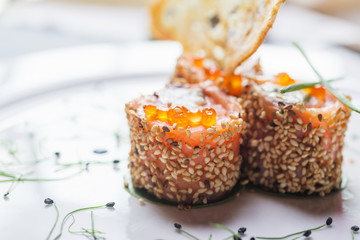 traditional japanese rolls with salmon and philadelphia cheese