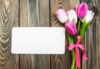 tulips with a card