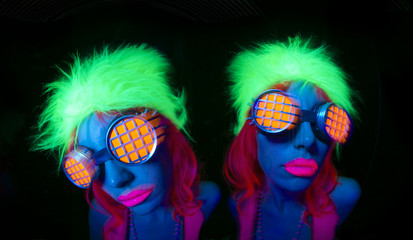Fototapeta na wymiar sexy neon uv glow dancer