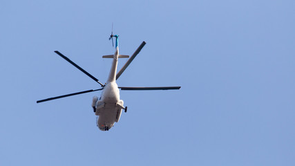 helicopter on a blue sky