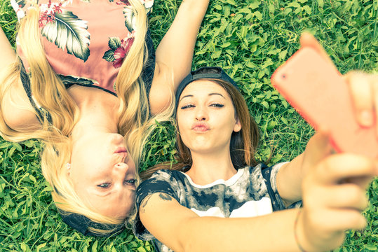 Two girls smiling at camera
