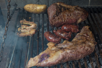 Argetine Asado  Barbecue, meat cooked over grill. Latin american