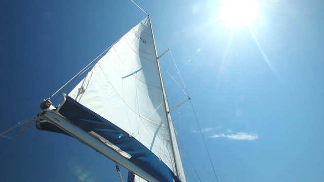 Sail floating in the wind on a beautiful sailboat