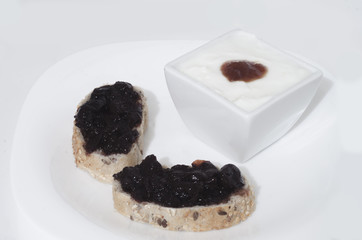 Bread with jam on white