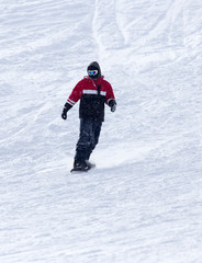 Fototapeta na wymiar snowboarder rides