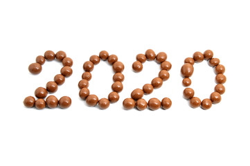  image 2020 of sweet chocolate round on a white background.