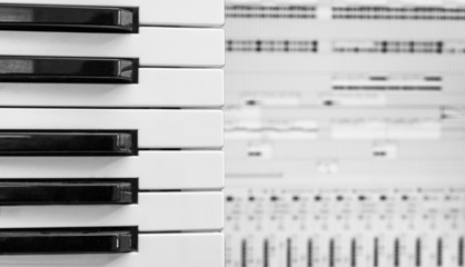 Piano keys over recording software background.