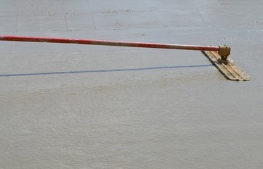 Floating a concrete slab