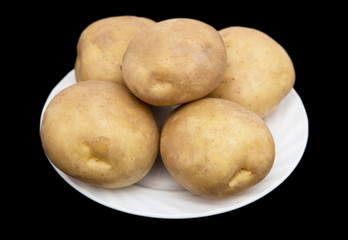 potatoes on a black background