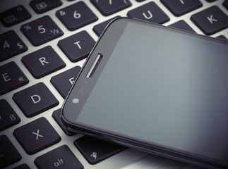 smart phone on tablet computer. technology and communication con