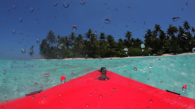 seakayaking arriving on beach