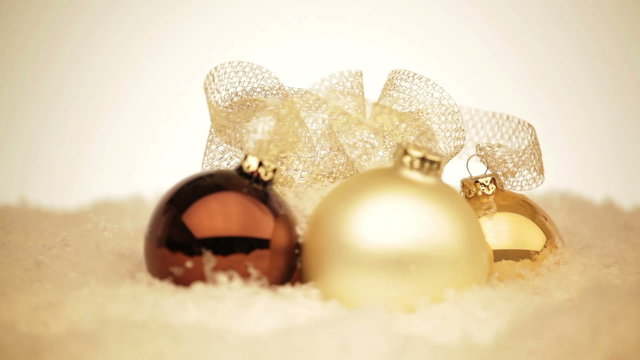 rotaing christmas baubles with bow
