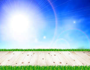 White wooden floor, green grass, blue sky