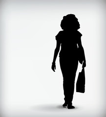 Black silhouette of a woman isolated on a white background