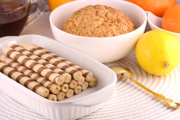 sweet cake on white plate with lemon