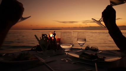 cheering with wine glasses close
