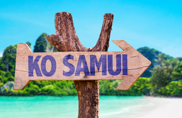 Ko Samui wooden sign with beach background