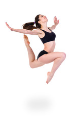 Fototapeta na wymiar young modern ballet dancer jumping on white background