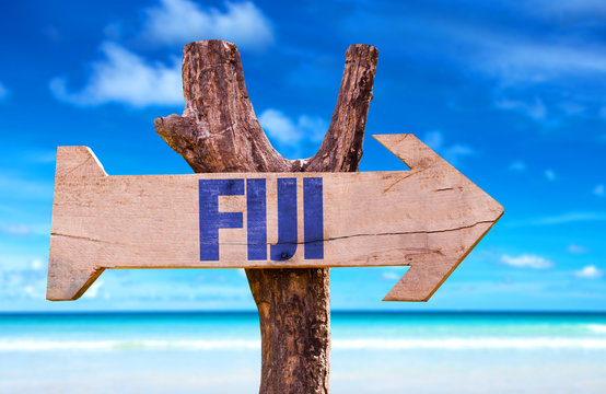 Fiji Wooden Sign With Beach Background