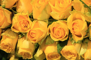 Yellow rose wedding arrangement