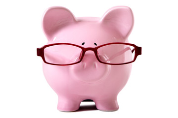 Pink piggy bank wearing glasses