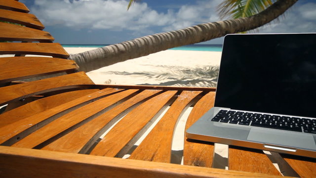 notebook on beach dolly close